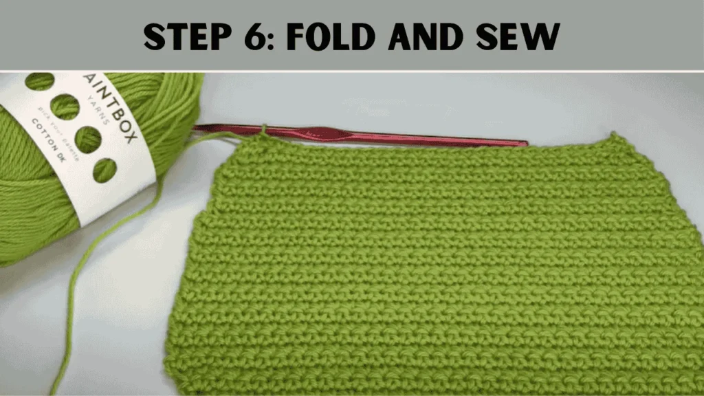 Now use the same yarn with your needle and neatly sew the sides of your crochet a purse. Use a simple whip stitch for this. Sew from the bottom of the crochet bag to where the flap will start. Congratulations, your purse is finished!